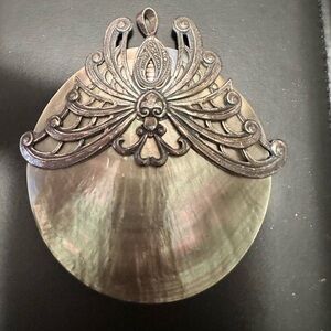 Custome Shell Bale. Sterling Silver. Signed by Artist.